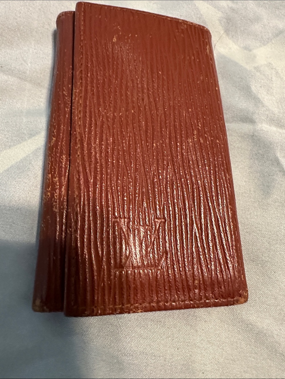 Louis Vuitton Embossed Epi Leather Card Holder in Brown